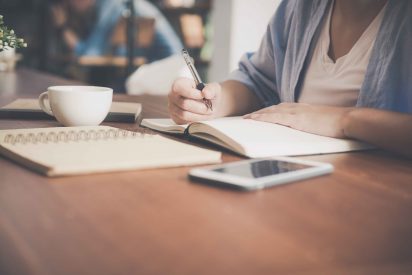 woman writing notes