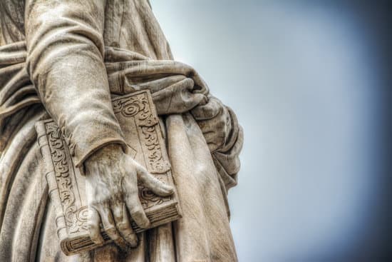 Close up of Dante Alighieri statue in Florence, Italy